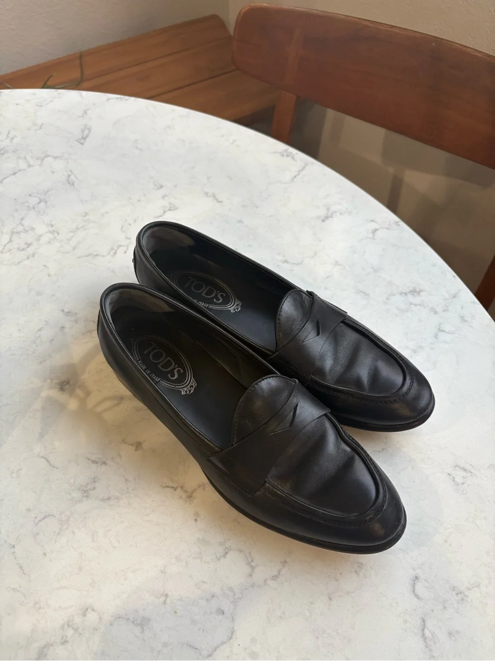 Tod’s Women’s Black Leather Penny Loafers 38